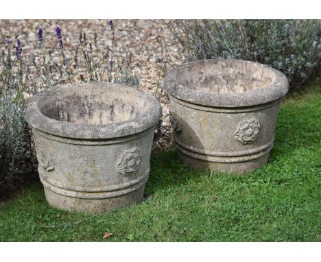 
	
		A composition stone fountain or bird bath, late 20th century, with circular basin above the cherub support, 60cm high, 4