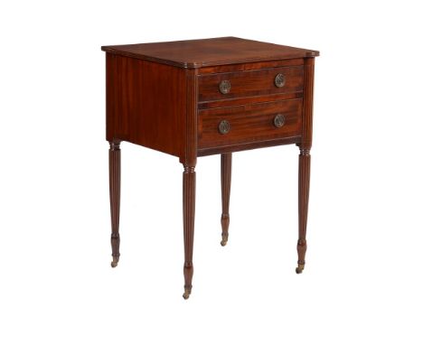 
	
		A Regency mahogany side table, circa 1820, with two drawers flanked by reeded angles above conforming tapering legs, 76c