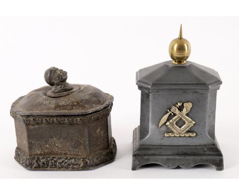 
	
		A late 18th century lead tobacco box, octagonal form with head of moor finial, 11cm x 13 cm; and another lead tobacco bo