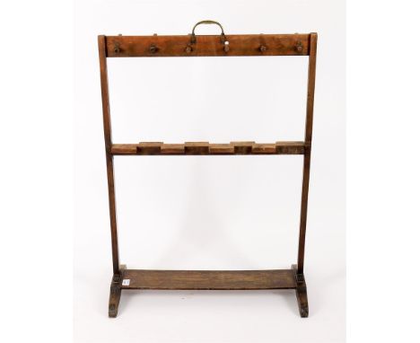 A Victorian mahogany and softwood boot and whip rack, 70cm wide, 99.5cm high, 34cm deep  Condition Report:  Fairly worn from 