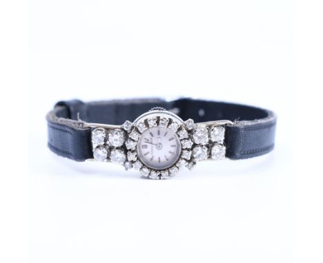 Jaeger leCoultre, witgouden mechanisch damespolshorloge. De lunette en aanzet bezet met briljant geslepen diamant, met een to