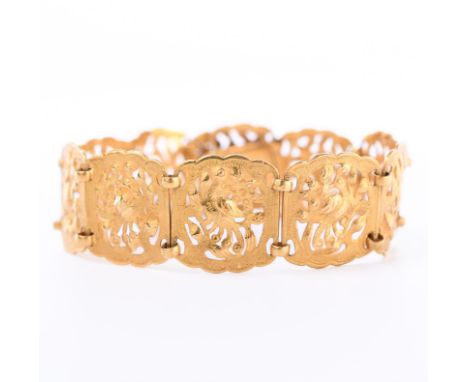 14 kt. Gouden armband. Opgebouwd uit tien opengewerkte appliques, allen met decor van een vogel bruto 11,1 gr., l. 14 cm, b. 