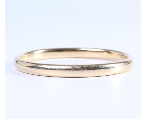 14 kt. Gouden stijve armband. Meesterteken Giezen metaalbewerking b.v. Zoeterwoude, vanaf 1995 netto 15,7 gr., binnenmt. 60 x