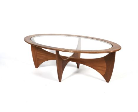 A 1960s G-Plan glass topped teak oval-shaped sofa table. On intersecting curved teak supports, L121.5cm x D66cm x H41cm