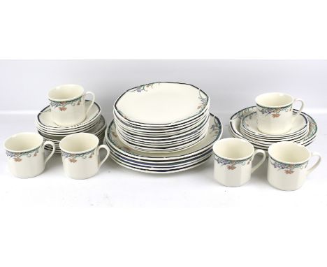 A six piece Royal Doulton tea and dinner service in the 'Juno' pattern. Comprising six cups and saucers, three bowls and mult