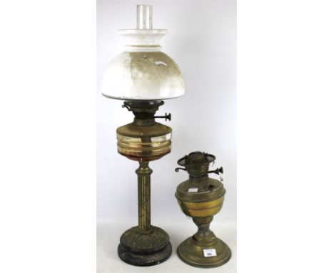 ON eoil lamp and one part lamp. One with glass and shade, H73cm, the other a brass lamp base.  