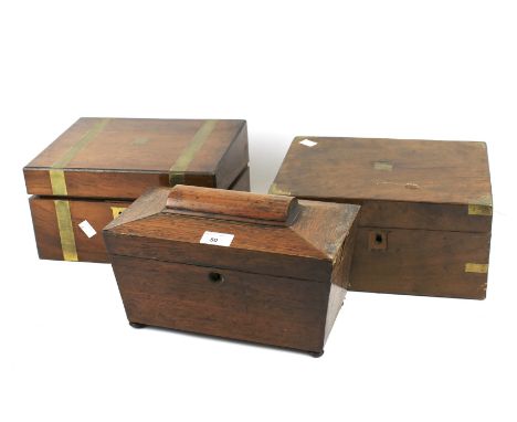 Writing boxes and a tea caddy. Both writing boxes slightly damaged, the tea caddy measuring H18cm x D17cm x W30cm. 