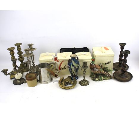A mixed lot of vintage household items. Including candlesticks, kitchen tin storage containers, china, glass and metal orname