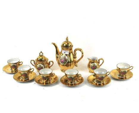 A gilt tea set. Comprising teapot, milk jug, sugar bowl and six cups and saucers. 