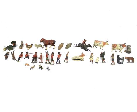 A collection of assorted vintage die-cast lead figures. Including mostly Farmyard animals, some soldiers and others. 