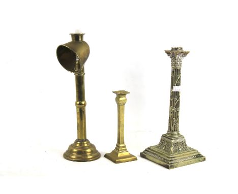 Three assorted vintage candlesticks. Including a brass candlestick H20.5cm, an EPNS Corinthian column candlestick, H33cm and 