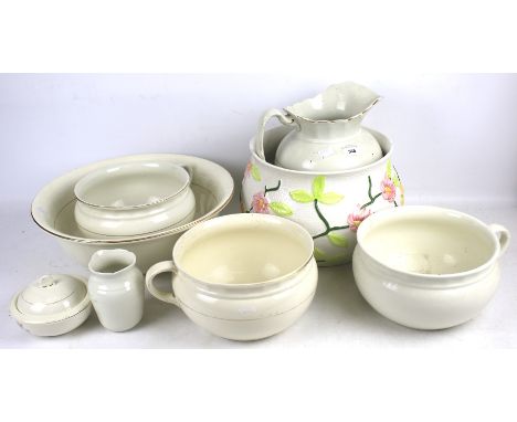 A selection of white ceramic table and wash sets. To include large jug, three handled bowls, shaving dish and pot, etc. 