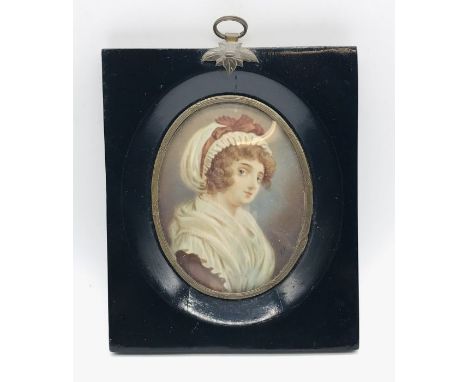 A portrait miniature of a lady monogrammed P.H