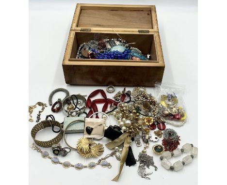 A collection of vintage costume jewellery in wooden box