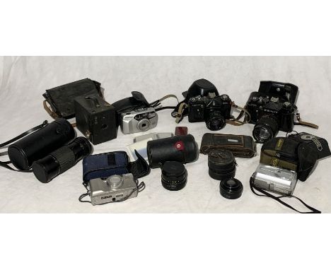 A collection of vintage cameras and lenses including 2 x Zenith, Sigma etc.