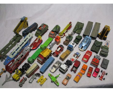 A collection of vintage play worn die-cast vehicles including Dinky, Corgi, Matchbox etc