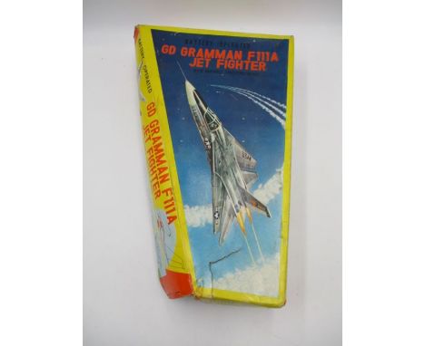 A vintage boxed  battery operated GD Gramman F111A Jet Fighter toy with variable sweeping wings - box A/F