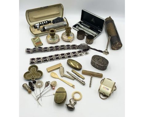 An assortment of items including two boxed vintage Heine Otoscopes, snuff boxes, silver plated belt etc. 