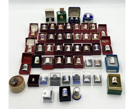 A collection of mainly ceramic boxed thimbles including Wedgwood Jasperware, Caverswall, Spode, Royal Worcester, Coalport, et