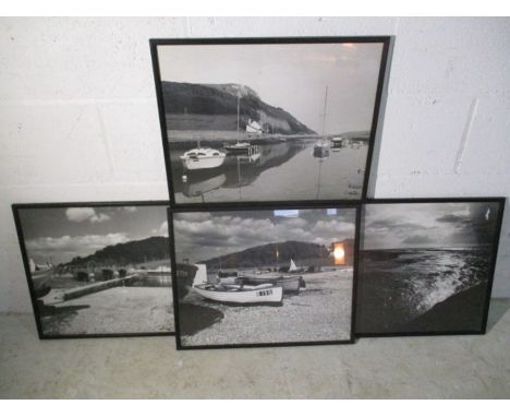A set of four black and white vintage photographs of Axmouth harbour