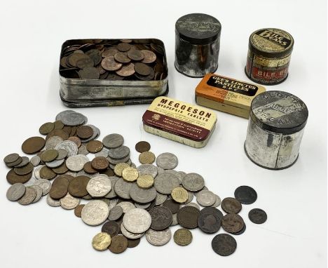 A collection of British and worldwide coinage including a large quantity of copper coinage, vintage tins etc.