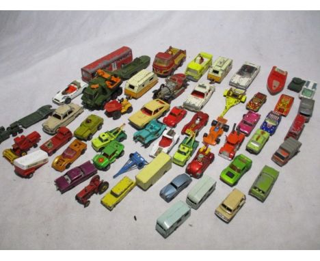 A collection of vintage play worn die-cast vehicles including Corgi, Matchbox, Dinky etc