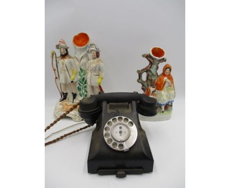 A vintage bakelite telephone along with two Staffordshire flatbacks