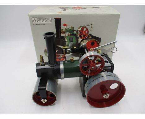 A boxed vintage Mamod Steam Roller with accessories.