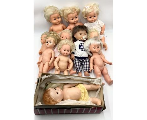 A collection of various vintage dolls including one by British National Dolls Ltd London in original gift box, Tiny Tears etc