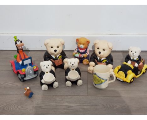 Collection of ringtons teddy bear money boxes together with egg cup plus goofy money box