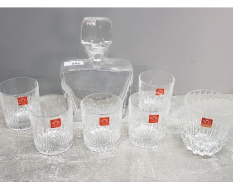 Clear glass decanter with stopper together with 6 crystal glass tumblers by Italian designer RCR Cristalleria Italianna