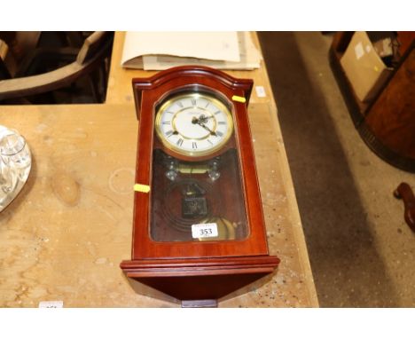 A Highlands mahogany cased two-hole wall clock