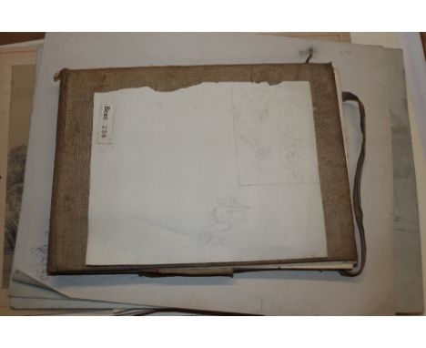 A collection of sketch books, various pencil sketches and prints