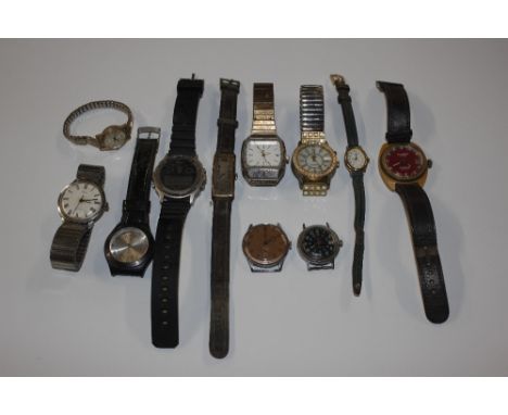 A box of various wrist watches to include Eloga Flipper wrist watch; a Reda wrist watch, Timex watches etc.