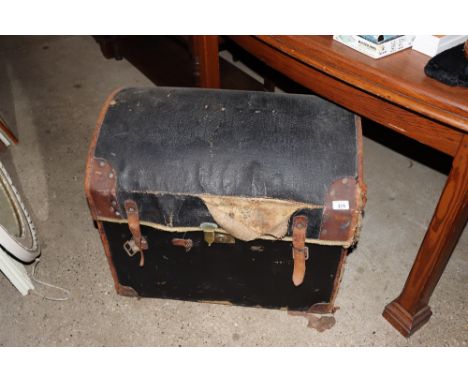 A leather and canvas dome topped trunk AF 