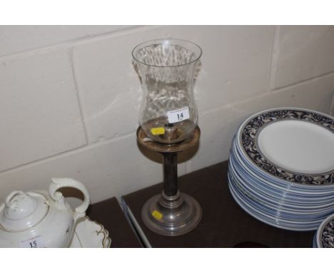 A Danish white metal candlestick with clear shade 