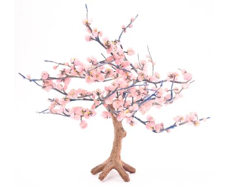 A mid 20th Century retro model of a cherry blossom tree. The wire branches with blue thread wrapped around and tied pink bead