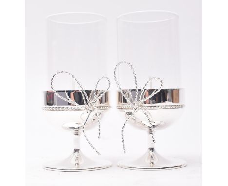 Vera Wang for Wedgwood - a modern boxed set of two chrome tea light holders. The tealight holders of silver metal and of gobl