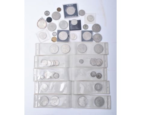 A collection of commemorative mostly 20th Century GB &amp; USA coins. The lot to include a 1780 sterling silver M. Theresia o
