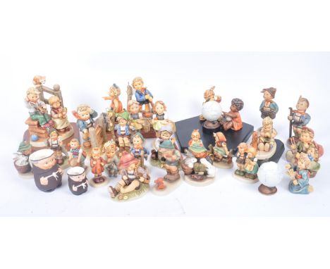 M. J. Hummel by Goebel - A large collection of vintage 20th century Goebel porcelain china figurines. The lot comprising a Mi