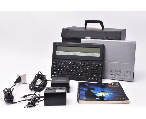 Cambridge Computer Ltd. - Z88 - a vintage 1980s portable computer, complete with user manual and in original silver case, alo