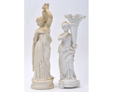 Parian ware - two late 19th century Parian ceramic classical female figurines, one wearing a toga and with urn resting on her