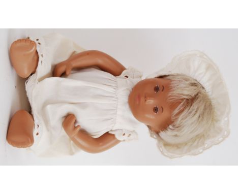 SASHA DOLL: An original vintage 1960's Sasha Doll baby white gown and matching bonnet, blonde hair. Along with a spare outfit