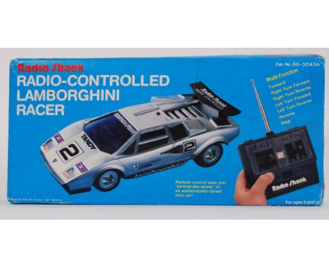 RADIO SHACK: An original vintage Radio Shack made radio controlled Lamborghini. Within the original box.