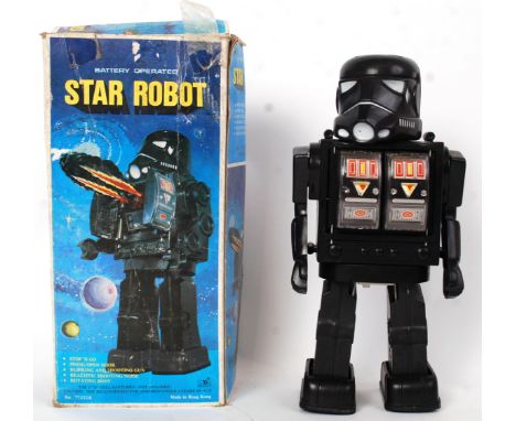 STAR ROBOT: An original vintage 1970's Made In Hong Kong ' Star Robot ,'. Clearly based on a Star Wars storm trooper. Black p
