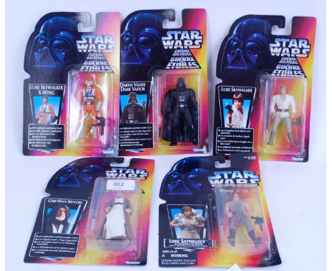 STAR WARS: A collection of 5x Kenner Star Wars Long Lightsaber variation carded sealed action figures. Circa 1995.