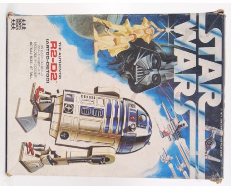 STAR WARS: An original vintage 1977 Star Wars Denys Fisher R2D2 model kit. 6" tall, unchecked, but is believed to be complete