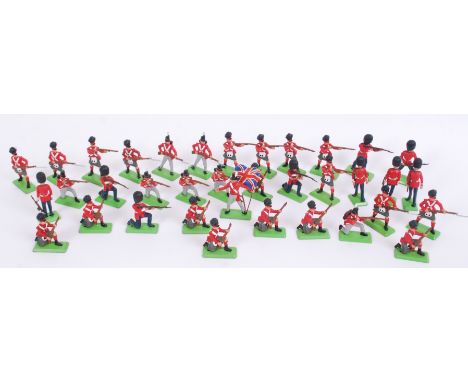BRITAINS DEETAIL: A collection of 36x vintage Britains Deetail plastic and metal based soldier figures, each mounted on metal
