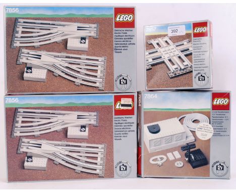 LEGO: A collection of vintage Lego railway trainset boxed accessories to include 7856 Points, 7864 Transformer and 7857 Cross