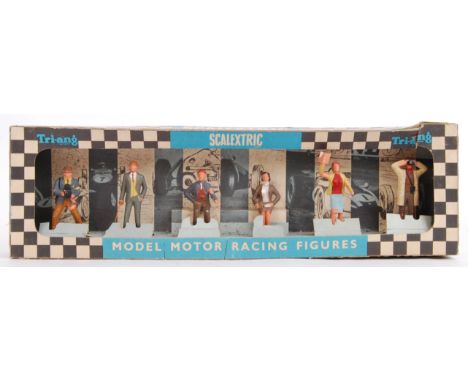 SCALEXTRIC: An original vintage Scalextric trackside Model Motor Racing Spectators set of figures, no. F301. Within the origi